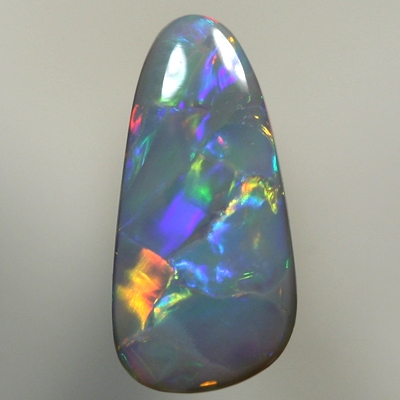 SOLID BLACK OPAL Large rolling flashes, red to gold to green